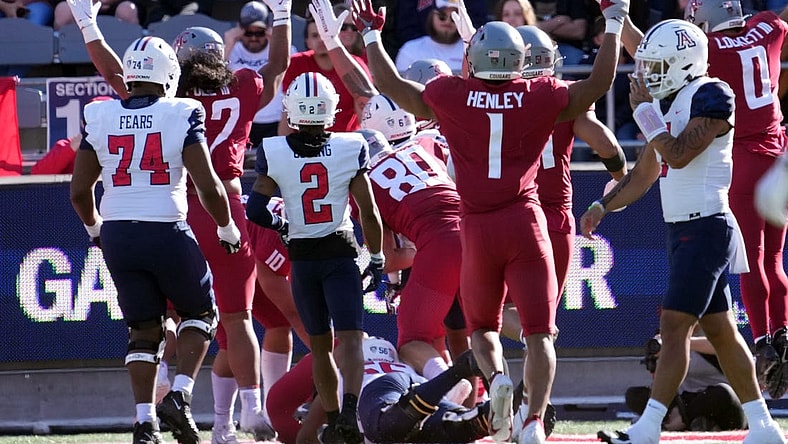 Nov 19, 2022; Tucson, Arizona, USA; Washington State Cougars celebrate a touchdown against the Arizona Wildcats during the second half at Arizona Stadium. Mandatory Credit: Joe Camporeale-USA TODAY Sports