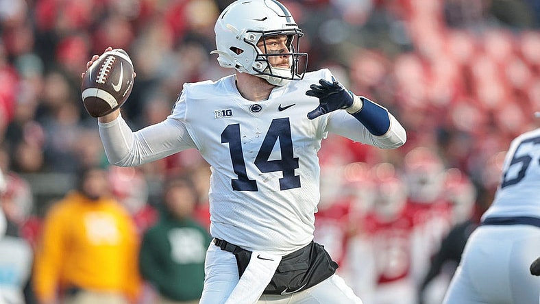 Nov 19, 2022; Piscataway, New Jersey, USA; Penn State Nittany Lions quarterback Sean Clifford (14) throws the ball during the first half against the Rutgers Scarlet Knights at SHI Stadium. Mandatory Credit: Vincent Carchietta-USA TODAY Sports
