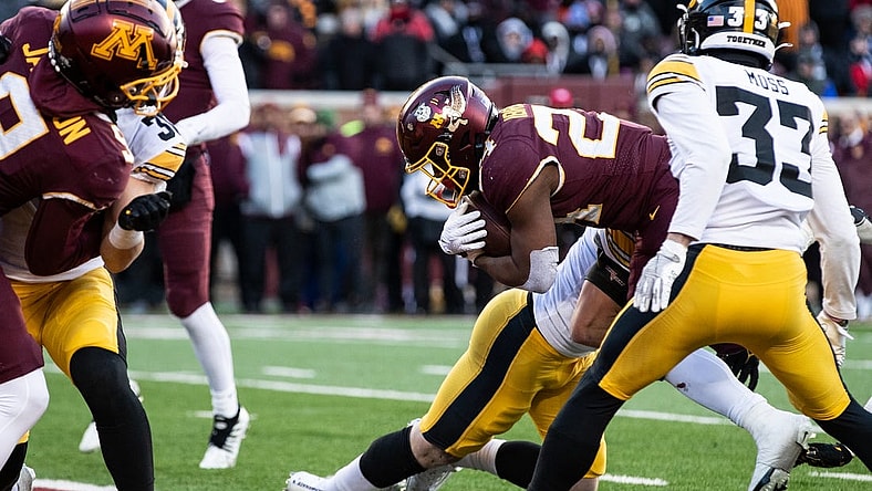 Nov 19, 2022; Minneapolis, Minnesota, USA; Minnesota Golden Gophers running back Mohamed Ibrahim (24) runs for a touchdown against the Iowa Hawkeyes during the second quarter at Huntington Bank Stadium. Mandatory Credit: Matt Krohn-USA TODAY Sports