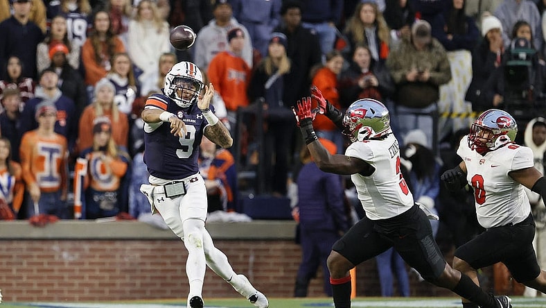 Nov 19, 2022; Auburn, Alabama, USA; Auburn Tigers quarterback Robby Ashford (9) shows a pass during the second quarter against the Western Kentucky Hilltoppers at Jordan-Hare Stadium. Mandatory Credit: John Reed-USA TODAY Sports