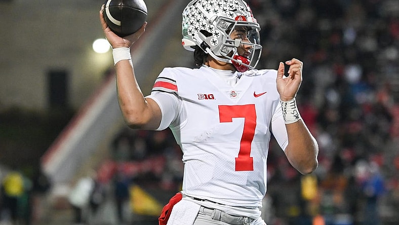 Nov 19, 2022; College Park, Maryland, USA; Ohio State Buckeyes quarterback C.J. Stroud (7) throws during the second half against the Maryland Terrapins  at SECU Stadium. Mandatory Credit: Tommy Gilligan-USA TODAY Sports