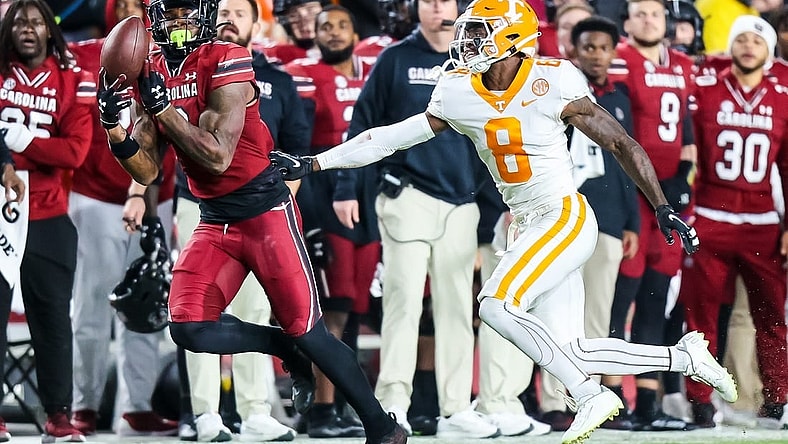 Nov 19, 2022; Columbia, South Carolina, USA; South Carolina Gamecocks tight end Jaheim Bell (0) drops a pass against Tennessee Volunteers defensive back Brandon Turnage (8) in the second quarter at Williams-Brice Stadium. Mandatory Credit: Jeff Blake-USA TODAY Sports