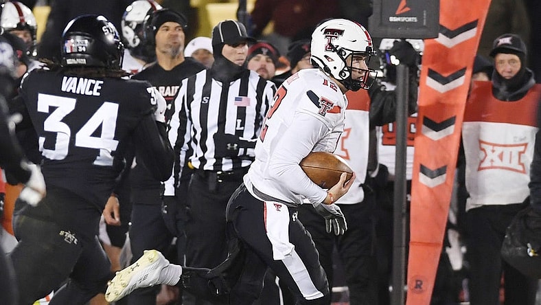 Nov. 19, 2022; Ames, Iowa, USA;  [CAPTION] Texas Tech Red Raiders quarterback Tyler Shough (12) runs with the ball for a first down around Iowa State Cyclones linebacker O'Rien Vance (34) during the second quarter in the senior day Big-12 showdown at Jack Trice Stadium. Mandatory Credit: Nirmalendu Majumdar/Ames Tribune-USA TODAY Network

Ncaa Football Texas Tech At Iowa State