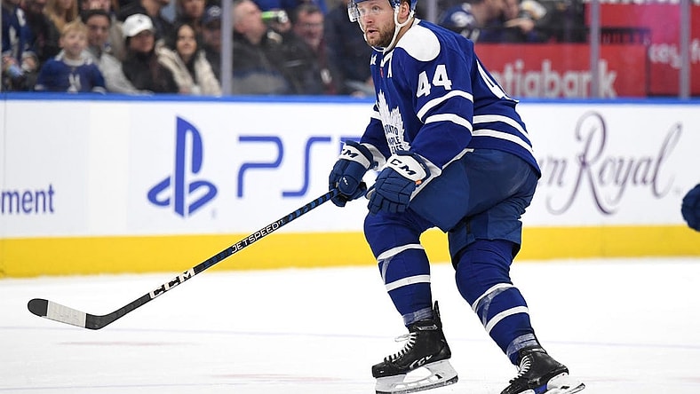 Nov 19, 2022; Toronto, Ontario, CAN;  Toronto Maple Leafs defenseman Morgan Rielly (44) defends his zone against the Buffalo Sabres in the third period at Scotiabank Arena. Mandatory Credit: Dan Hamilton-USA TODAY Sports
