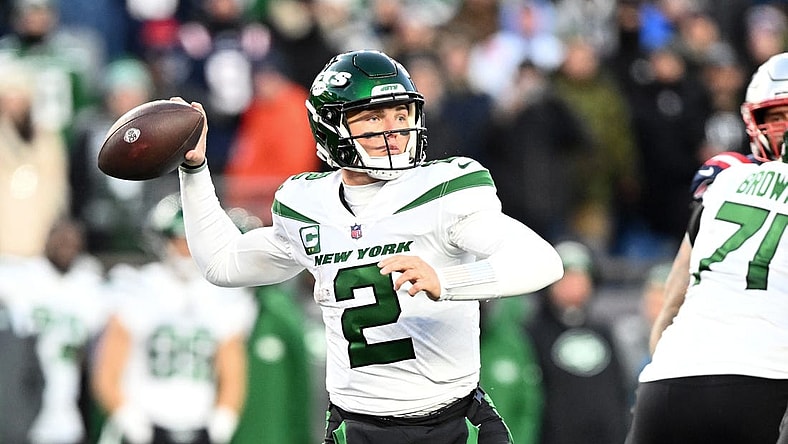 Nov 20, 2022; Foxborough, Massachusetts, USA; New York Jets quarterback Zach Wilson (2) passes the ball against the New England Patriots during the second half at Gillette Stadium. Mandatory Credit: Brian Fluharty-USA TODAY Sports