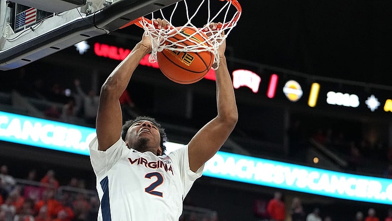 Nov 20, 2022; Las Vegas, Nevada, USA; Virginia Cavaliers guard Reece Beekman (2) dunks against the Illinois Fighting Illini during the second half at T-Mobile Arena. Mandatory Credit: Stephen R. Sylvanie-USA TODAY Sports