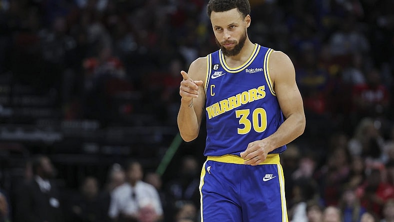 Nov 20, 2022; Houston, Texas, USA; Golden State Warriors guard Stephen Curry (30) reacts after a play during the fourth quarter against the Houston Rockets at Toyota Center. Mandatory Credit: Troy Taormina-USA TODAY Sports