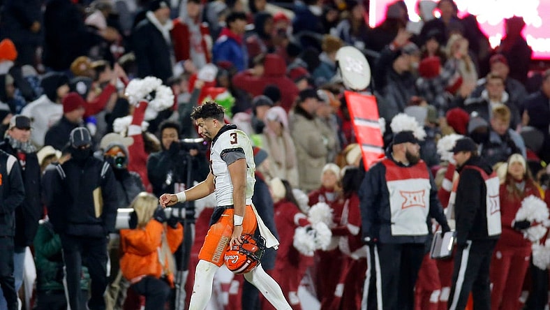 OSU's Spencer Sanders (3) walks off the field after an interception during a Bedlam college football game between the University of Oklahoma Sooners (OU) and the Oklahoma State University Cowboys (OSU) at Gaylord Family-Oklahoma Memorial Stadium in Norman, Okla., Saturday, Nov. 19, 2022. Oklahoma won 28-13.
osujournal -- print1