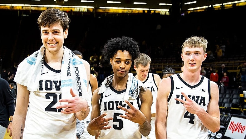 Iowa players, from left, Patrick McCaffery, Dasonte Bowen and Josh Dix pose for a photo after a NCAA men's basketball game against Omaha, Monday, Nov. 21, 2022, at Carver-Hawkeye Arena in Iowa City, Iowa.

221121 Omaha Iowa Mbb 053 Jpg