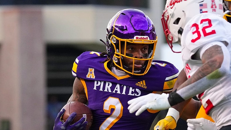 Nov 19, 2022; Greenville, North Carolina, USA;  East Carolina Pirates running back Keaton Mitchell (2) runs with the ball against the Houston Cougars during the first half at Dowdy-Ficklen Stadium. Mandatory Credit: James Guillory-USA TODAY Sports