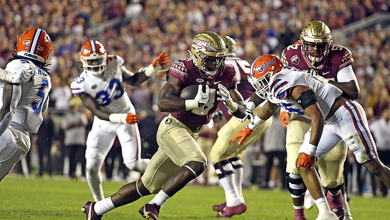 Nov 25, 2022; Tallahassee, Florida, USA; Florida State Seminoles running back Trey Benson (3) runs for a touchdown during the first quarter against the Florida Gators at Doak S. Campbell Stadium. Mandatory Credit: Melina Myers-USA TODAY Sports