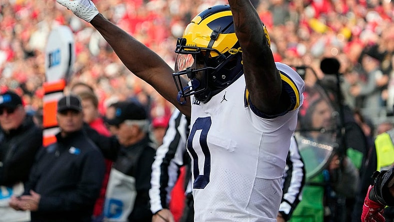Nov 26, 2022; Columbus, OH, USA; Michigan Wolverines defensive back Mike Sainristil (0) celebrates after knocking the ball away from Ohio State Buckeyes tight end Cade Stover (8) on a play in the end zone in the fourth quarter of their game at Ohio Stadium.
Osu22um Kwr 55