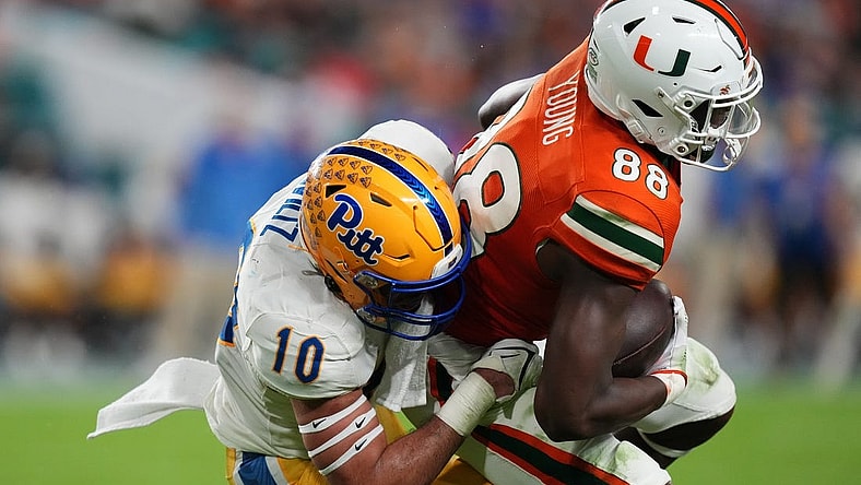 Nov 26, 2022; Miami Gardens, Florida, USA; Pittsburgh Panthers linebacker Tylar Wiltz (10) tackles Miami Hurricanes wide receiver Colbie Young (88) during the first half at Hard Rock Stadium. Mandatory Credit: Jasen Vinlove-USA TODAY Sports