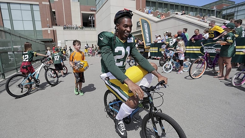 2016: Green Bay Packers free safety Ha Ha Clinton-Dix (21) smiles as he rides a bike to Green Bay Packers training camp  August 15, 2016.

2016 2