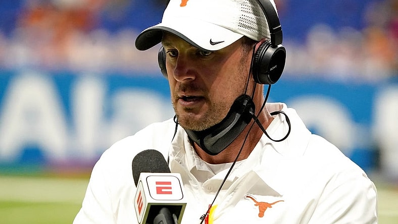 Dec 29, 2020; San Antonio, TX, USA; Texas Longhorns head coach Tom Herman is being interviewed during the first half against the Colorado Buffaloes at Alamodome. Mandatory Credit: Kirby Lee-USA TODAY Sports