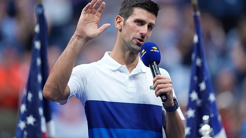 Sep 12, 2021; Flushing, NY, USA; Novak Djokovic of Serbia speaks to the crowd during the trophy presentation ceremony after his match against Daniil Medvedev of Russia (not pictured) in the men's singles final on day fourteen of the 2021 U.S. Open tennis tournament at USTA Billie Jean King National Tennis Center. Mandatory Credit: Danielle Parhizkaran-USA TODAY Sports