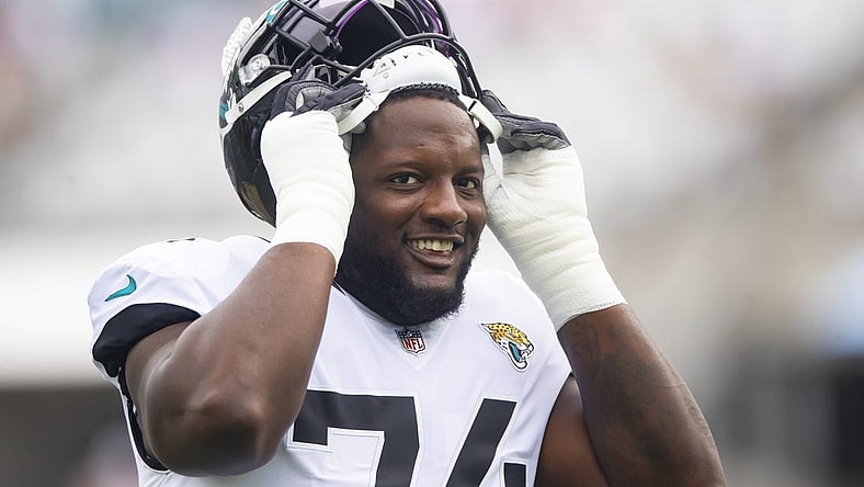 Sep 19, 2021; Jacksonville, Florida, USA; Jacksonville Jaguars offensive tackle Cam Robinson (74) against the Denver Broncos at TIAA Bank Field. Mandatory Credit: Mark J. Rebilas-USA TODAY Sports