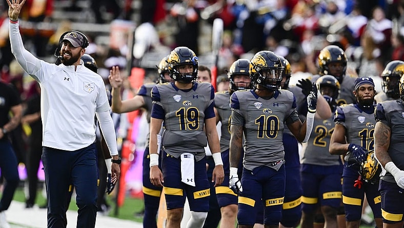 Sep 25, 2021; College Park, Maryland, USA; Kent State Golden Flashes head coach Sean Lewis walks with players at the beginning of the fourth quarter against the Maryland Terrapins at Capital One Field at Maryland Stadium. Mandatory Credit: Tommy Gilligan-USA TODAY Sports