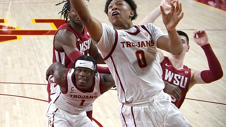 Feb 20, 2022; Los Angeles, California, USA;  USC Trojans guard Boogie Ellis (0) drives up for a basket in the first half against the Washington State Cougars at Galen Center. Mandatory Credit: Jayne Kamin-Oncea-USA TODAY Sports
