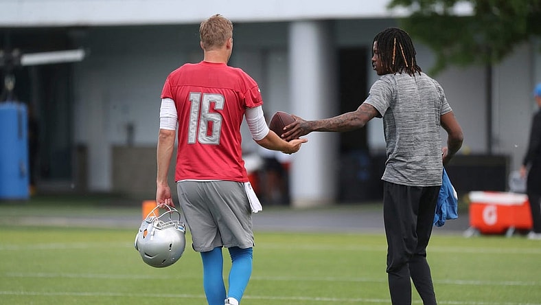 Lions quarterback Jared Goff, left, and receiver Jameson Williams play walk off the field after playing catch after practice during minicamp on Thursday, June 9, 2022, in Allen Park.
Lions