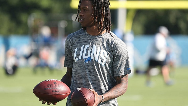 Detroit Lions receiver Jameson Williams watches passing drills during practice Thursday, July 28, 2022 at the Allen Park practice facility.

Lions1