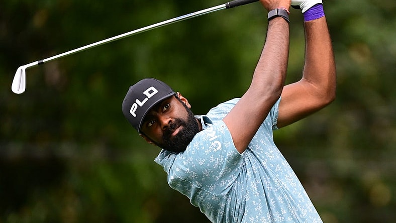 Aug 25, 2022; Atlanta, Georgia, USA; Sahith Theegala tees off on the 2nd hole during the first round of the TOUR Championship golf tournament. Mandatory Credit: Adam Hagy-USA TODAY Sports