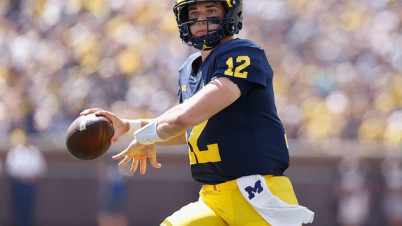 Sep 3, 2022; Ann Arbor, Michigan, USA;  Michigan Wolverines quarterback Cade McNamara (12) passes against the Colorado State Rams at Michigan Stadium. Mandatory Credit: Rick Osentoski-USA TODAY Sports