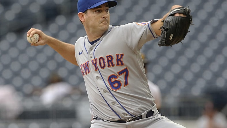 Sep 7, 2022; Pittsburgh, Pennsylvania, USA;  New York Mets relief pitcher Seth Lugo (67) pitches against the Pittsburgh Pirates during the eighth inning at PNC Park. Mandatory Credit: Charles LeClaire-USA TODAY Sports
