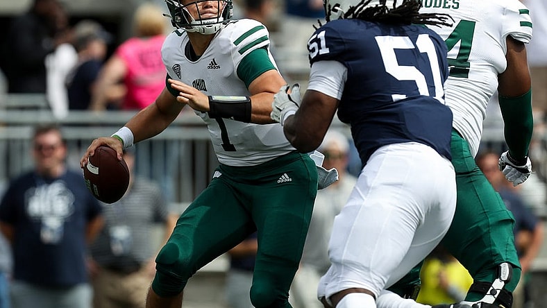 Sep 10, 2022; University Park, Pennsylvania, USA; Ohio Bobcats quarterback Kurtis Rourke (7) is pressured by Penn State Nittany Lions defensive tackle Hakeem Beamon (51) during the first quarter at Beaver Stadium. Mandatory Credit: Matthew OHaren-USA TODAY Sports
