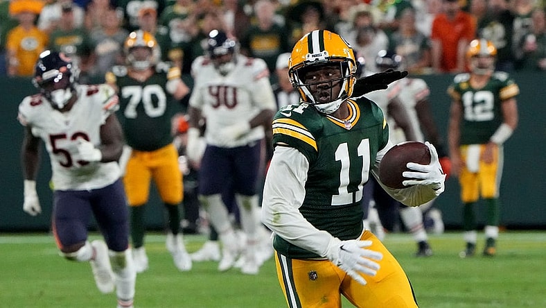 Sep 18, 2022; Green Bay, Wisconsin, USA; Green Bay Packers wide receiver Sammy Watkins (11) picks up 14 yards on a reception during the fourth quarter of their game at Lambeau Field. Mandatory Credit: Mark Hoffman/Milwaukee Journal Sentinel