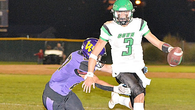 Pierre's Lincoln Kienholz scrambles against Watertown's Spencer Wientjes during their Eastern South Dakota Conference football game on Friday, Sept. 23, 2022 at Watertown Stadium. Pierre won 47-13.