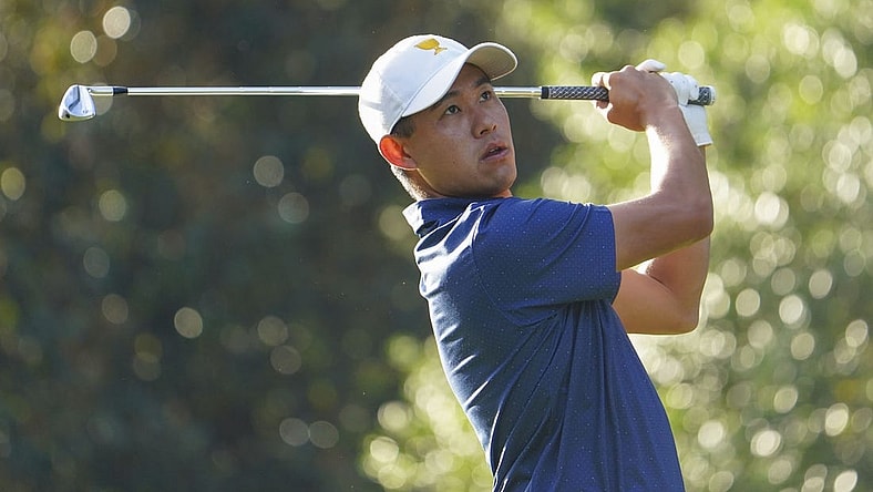 Sep 24, 2022; Charlotte, North Carolina, USA; Team USA golfer Collin Morikawa hits his tee shot on the sixth hole during the foursomes match play of the Presidents Cup golf tournament at Quail Hollow Club. Mandatory Credit: Peter Casey-USA TODAY Sports