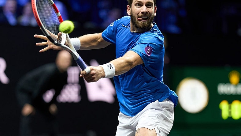 Sep 24, 2022; London, United Kingdom;Cameron Norrie (GBR) plays a shot against Taylor Fritz (USA) in a Laver Cup singles match.  Mandatory Credit: Peter van den Berg-USA TODAY Sports
