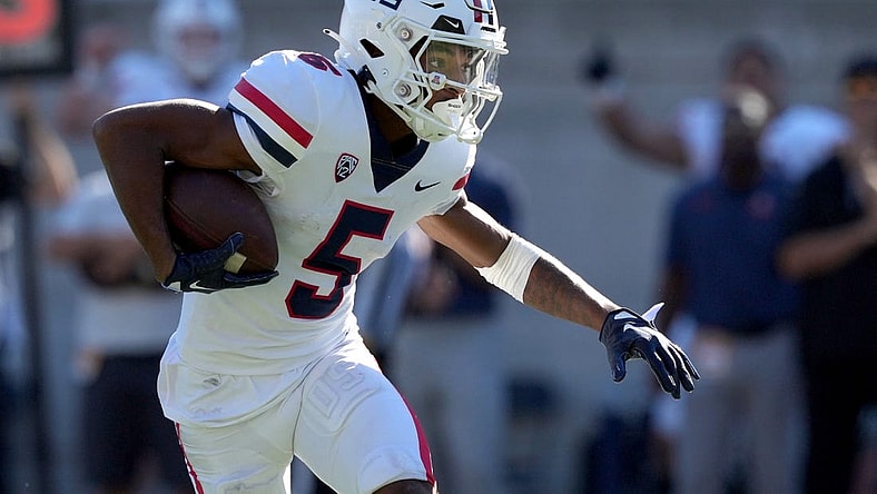 Sep 24, 2022; Berkeley, California, USA; Arizona Wildcats wide receiver Dorian Singer (5) runs after a catch against the California Golden Bears during the second quarter at FTX Field at California Memorial Stadium. Mandatory Credit: Darren Yamashita-USA TODAY Sports
