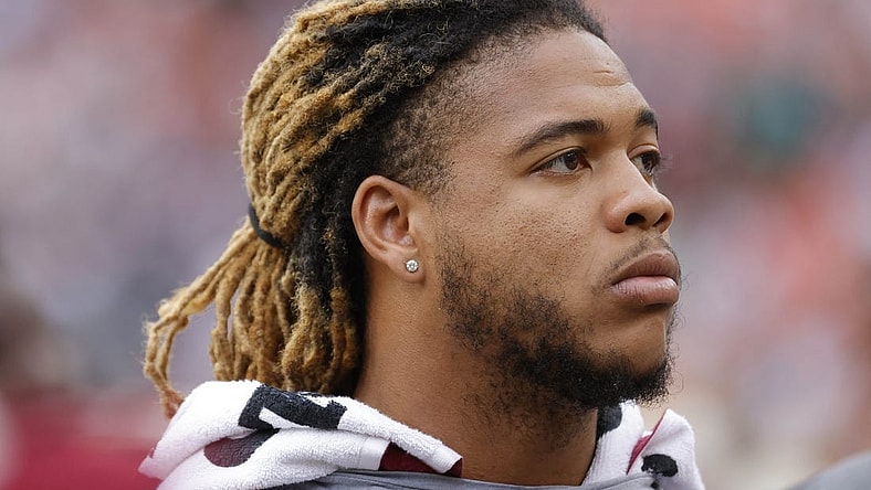 Sep 25, 2022; Landover, Maryland, USA; Injured Washington Commanders defensive end Chase Young stands on the sidelines against the Philadelphia Eagles at FedExField. Mandatory Credit: Geoff Burke-USA TODAY Sports