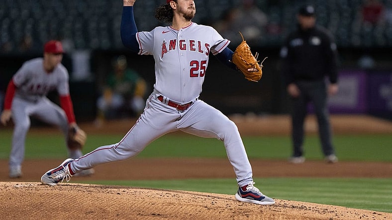 Oct 4, 2022; Oakland, California, USA;  Los Angeles Angels starting pitcher Michael Lorenzen (25) pitches during the first inning against the Oakland Athletics at RingCentral Coliseum. Mandatory Credit: Stan Szeto-USA TODAY Sports