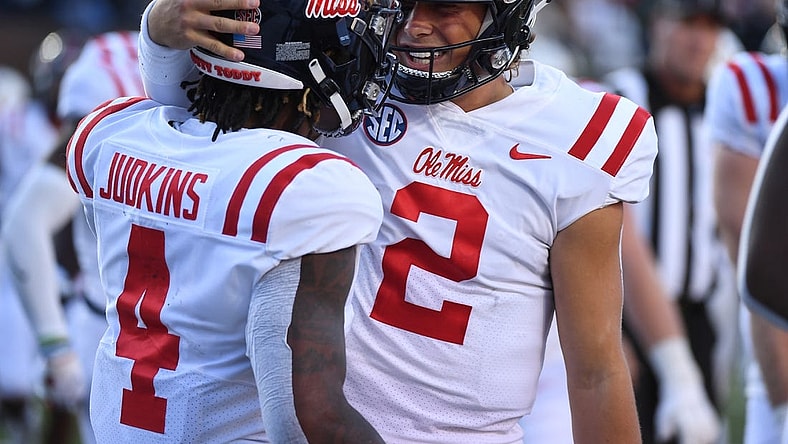 Oct 8, 2022; Nashville, Tennessee, USA; Mississippi Rebels running back Quinshon Judkins (4) celebrates with quarterback Jaxson Dart (2) after scoring against the Vanderbilt Commodores during the second half at FirstBank Stadium. Mandatory Credit: Christopher Hanewinckel-USA TODAY Sports