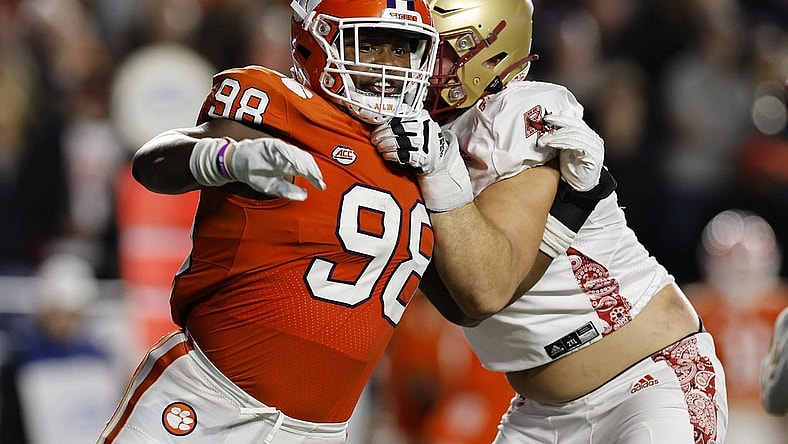 Oct 8, 2022; Chestnut Hill, Massachusetts, USA; Clemson Tigers defensive end Myles Murphy (98) fights to get past Boston College Eagles offensive lineman Ozzy Trapilo (70) during the second quarter at Alumni Stadium. Mandatory Credit: Winslow Townson-USA TODAY Sports
