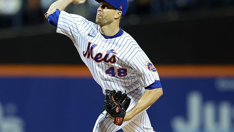 Oct 8, 2022; New York City, New York, USA; New York Mets starting pitcher Jacob deGrom (48) throws a pitch in the first inning during  game two of the Wild Card series against the San Diego Padres for the 2022 MLB Playoffs at Citi Field. Mandatory Credit: Brad Penner-USA TODAY Sports