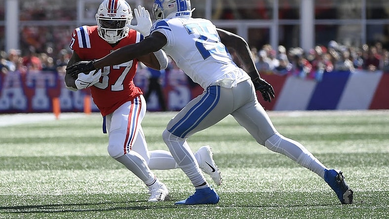 Oct 9, 2022; Foxborough, Massachusetts, USA; New England Patriots running back Damien Harris (37) runs with the ball while Detroit Lions safety Will Harris (25) defends during the first half at Gillette Stadium. Mandatory Credit: Bob DeChiara-USA TODAY Sports