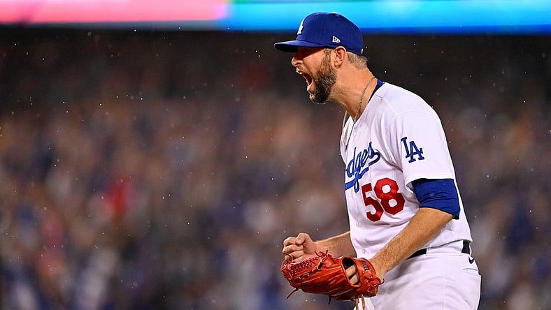 Oct 11, 2022; Los Angeles, California, USA; Los Angeles Dodgers relief pitcher Chris Martin (58) reacts after defeating the San Diego Padres during game one of the NLDS for the 2022 MLB Playoffs at Dodger Stadium. Mandatory Credit: Jayne Kamin-Oncea-USA TODAY Sports