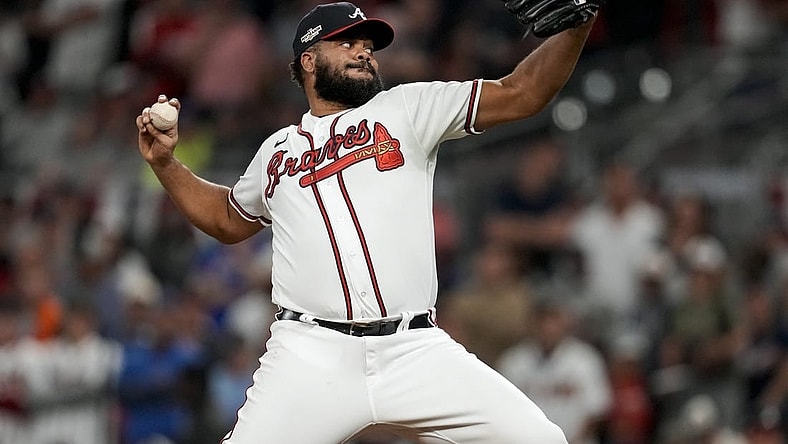 Oct 12, 2022; Atlanta, Georgia, USA; Atlanta Braves relief pitcher Kenley Jansen (74) throws against the Philadelphia Phillies in the ninth inning during game two of the NLDS for the 2022 MLB Playoffs at Truist Park. Mandatory Credit: Dale Zanine-USA TODAY Sports