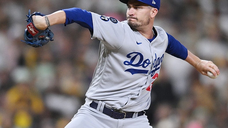 Oct 14, 2022; San Diego, California, USA; Los Angeles Dodgers starting pitcher Andrew Heaney (28) throws a pitch in the second inning against the San Diego Padres during game three of the NLDS for the 2022 MLB Playoffs at Petco Park. Mandatory Credit: Orlando Ramirez-USA TODAY Sports
