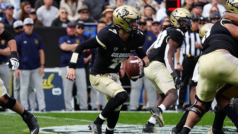 Oct 15, 2022; Boulder, Colorado, USA; Colorado Buffaloes quarterback Owen McCown (7) scrambles in the second quarter against the California Golden Bears at Folsom Field. Mandatory Credit: Ron Chenoy-USA TODAY Sports