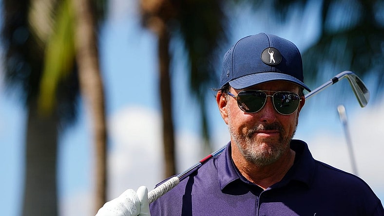 Oct 28, 2022; Miami, Florida, USA; Phil Mickelson warms up on the ninth tee box during the first round of the season finale of the LIV Golf series at Trump National Doral. Mandatory Credit: John David Mercer-USA TODAY Sports