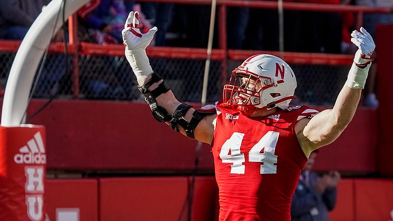 Nov 5, 2022; Lincoln, Nebraska, USA; Nebraska Cornhuskers defensive end Garrett Nelson (44) celebrates after a stop against the Minnesota Golden Gophers during the first quarter at Memorial Stadium. Mandatory Credit: Dylan Widger-USA TODAY Sports