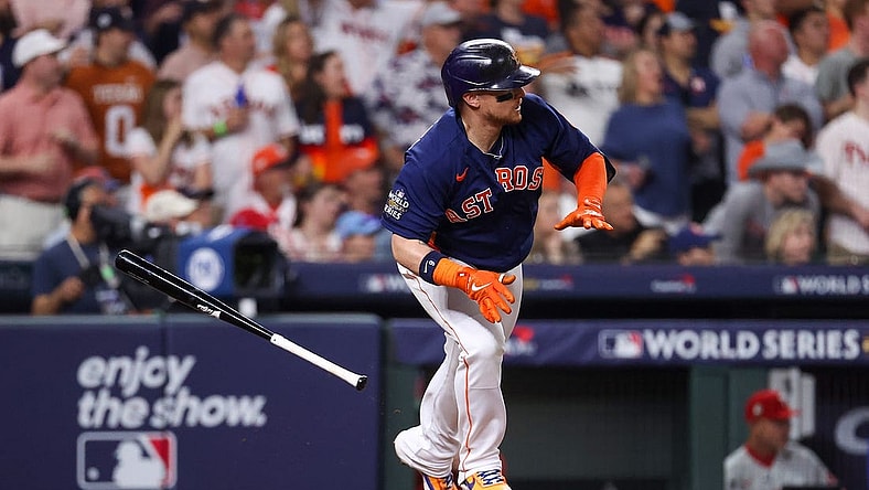 Nov 5, 2022; Houston, Texas, USA; Houston Astros designated hitter Christian Vazquez (9) hits a one run single against the Philadelphia Phillies during the sixth inning in game six of the 2022 World Series at Minute Maid Park. Mandatory Credit: Troy Taormina-USA TODAY Sports