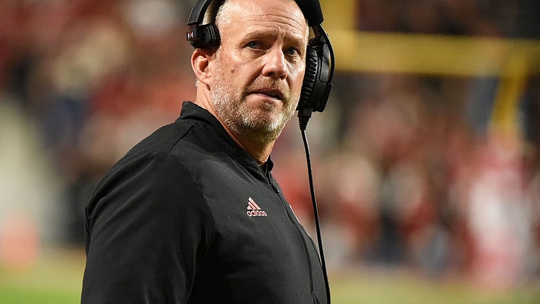 Nov 12, 2022; Raleigh, North Carolina, USA;  North Carolina State Wolfpack head coach Dave Doeren watches a replay on the scoreboard during the second half against the Boston College Eagles  at Carter-Finley Stadium. The Eagles won 21-20. Mandatory Credit: Rob Kinnan-USA TODAY Sports