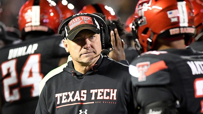 Texas Tech's head football coach Joey McGuire stands on the sidelines during a timeout against Kansas in a Big 12 football game, Saturday, Nov. 12, 2022, at Jones AT&T Stadium.