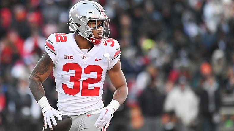 Nov 19, 2022; College Park, Maryland, USA; Ohio State Buckeyes running back TreVeyon Henderson (32) reacts after scoring a first quarter touchdown against the Maryland Terrapins  at SECU Stadium. Mandatory Credit: Tommy Gilligan-USA TODAY Sports